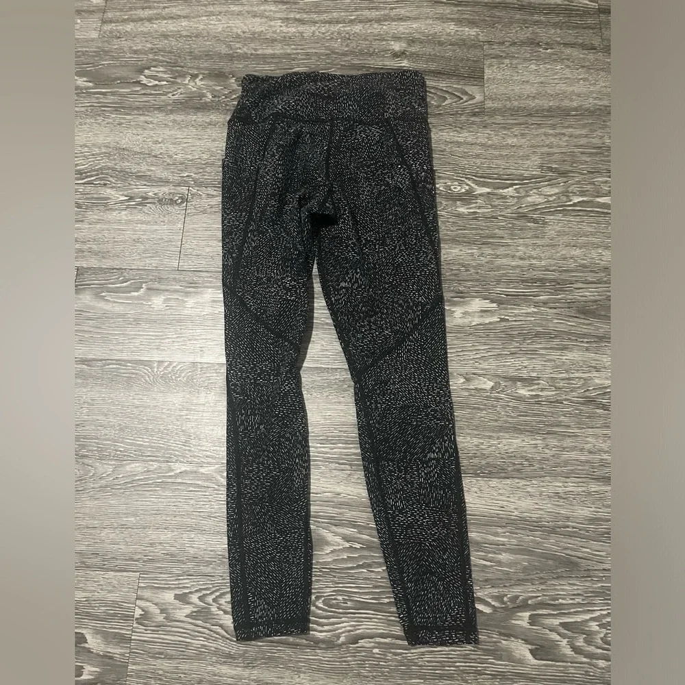 Athleta Salutation Stash Pocket Rainwater Tight leggings size small - Picture 10 of 10